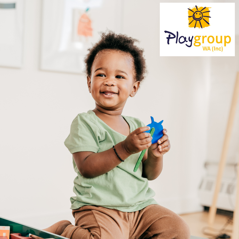 Play ideas, Play Group WA, child holds craft toy
